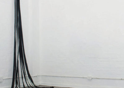 Carol-Anne Gainer, Vent, Plaster cast domestic vent, black satin ribbon, 2005, Dimensions variable